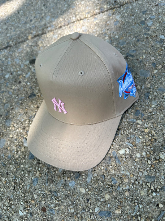 Ny baby logo cap tan n pink
