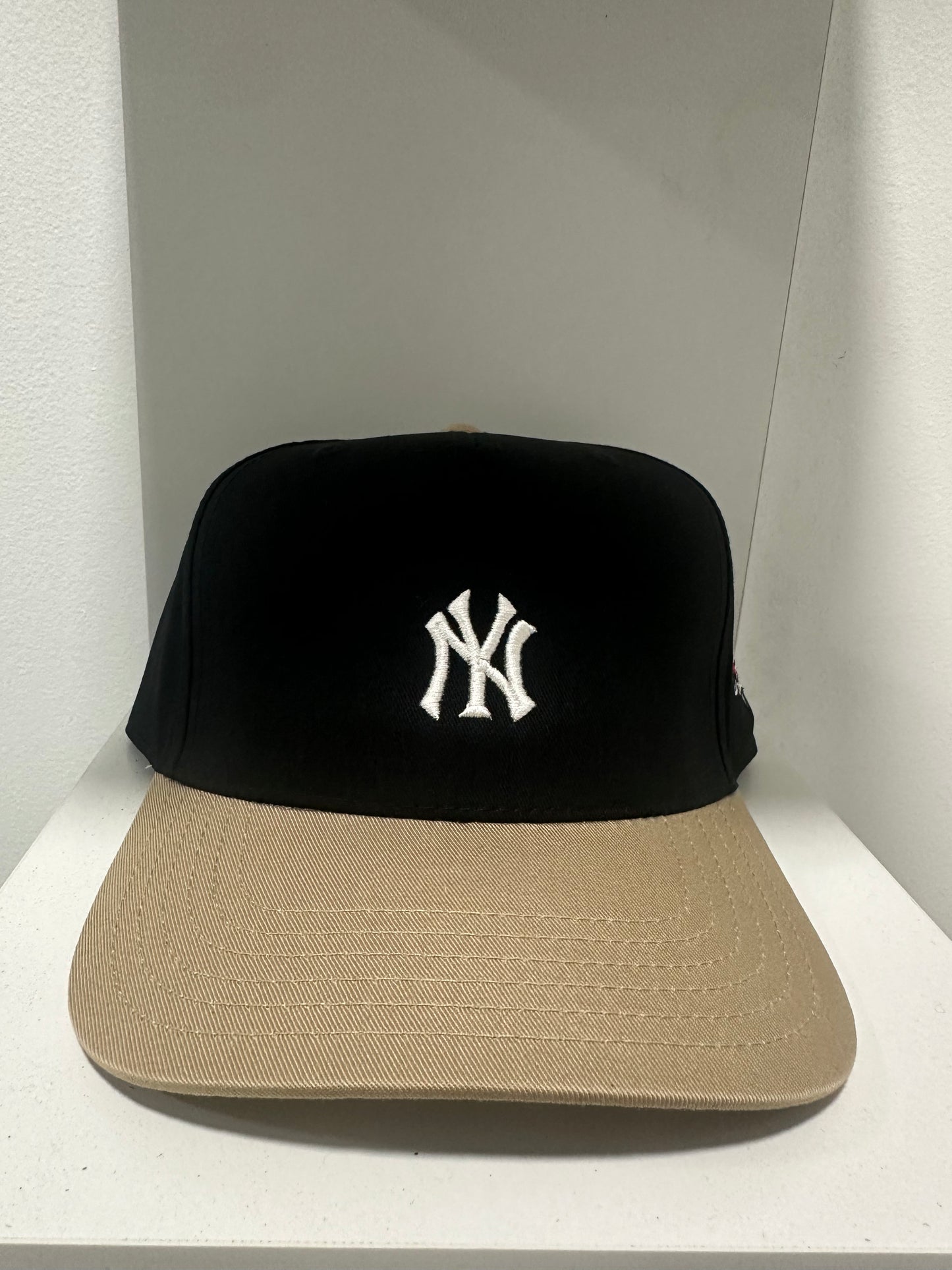 Black & tan baby logo ny cap