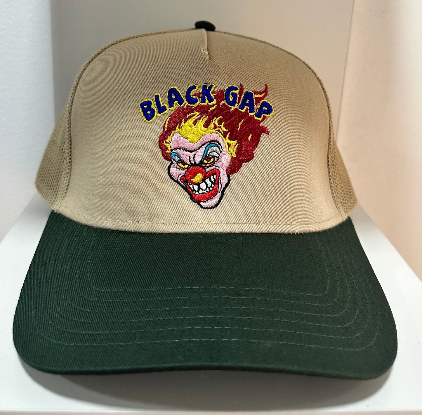 Gap teeth clown green brim